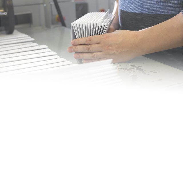 Worker producing mail pieces